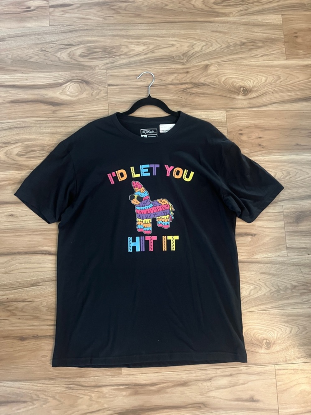 Black Unisex Graphic Tee with Colorful Hit It Pinata Design